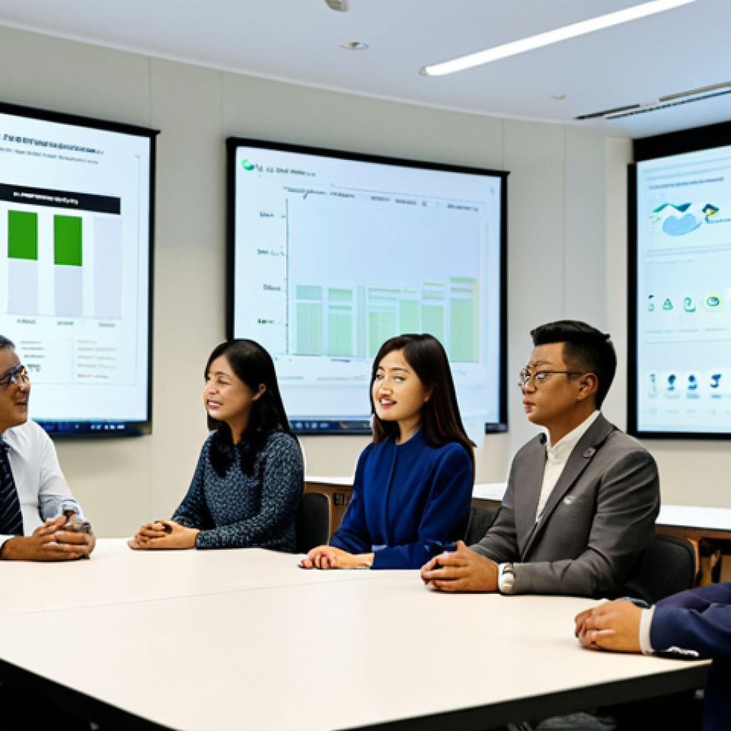 A diverse group of Malaysian professionals, including men and women, in a modern, well-lit conference room. They are engaged in a collaborative meeting, looking at large display screens that show data visualizations related to national carbon emission targets, sustainable development goals, and economic charts, subtly referencing "RMK12" or "WKB2030" as policy frameworks. They are dressed in modest business attire, including suits, and professional Baju Kurung or Kebaya. The room features contemporary design and touches of greenery. Professional photography, high quality, realistic, perfect anatomy, correct proportions, natural pose, well-formed hands, proper finger count, natural body proportions, fully clothed, modest clothing, appropriate attire, professional dress, safe for work, appropriate content, family-friendly.